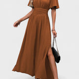 Eterna | Elegantiška Juoda Maxi Suknelė su V Formos Iškirpte, Plačiomis Rankovėmis ir Šonine Iškirpte