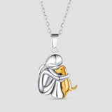 Šuns apkabinimo pakabukas