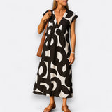 Magda| Laisvas suknelė su V formos iškirpte