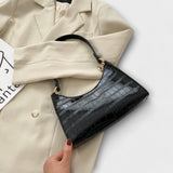 Lora. - Blizgi odinė rankinė