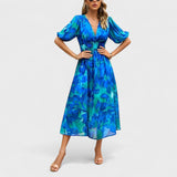 Clara – Elegantiška Midi Gėlių Suknelė