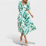 Clara – Elegantiška Midi Gėlių Suknelė