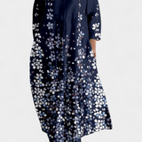 Anne | Sklandus suknelė su V formos iškirpte ir spalvota spauda