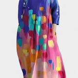 Anne | Sklandus suknelė su V formos iškirpte ir spalvota spauda