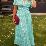 Sandra | Elegantiška maxi suknelė su V formos iškirpte