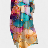 Anne | Sklandus suknelė su V formos iškirpte ir spalvota spauda