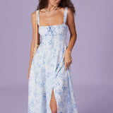 Renata | Midi mėlynas su gėlių raštu, kvadratiniais iškirpimu ir raukšlėmis