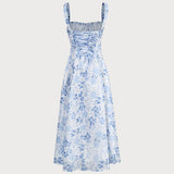 Renata | Midi mėlynas su gėlių raštu, kvadratiniais iškirpimu ir raukšlėmis